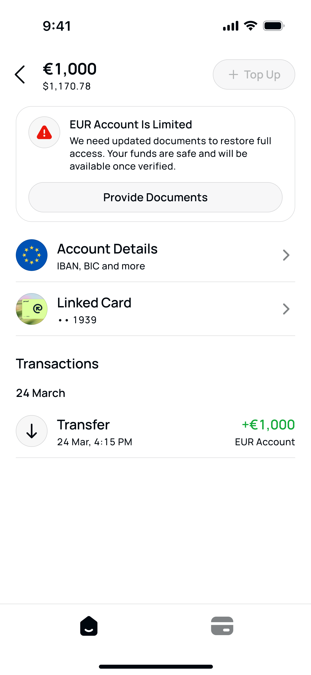EUR account marked as limited: the warning card, disabled Top Up, account details and the transaction list
